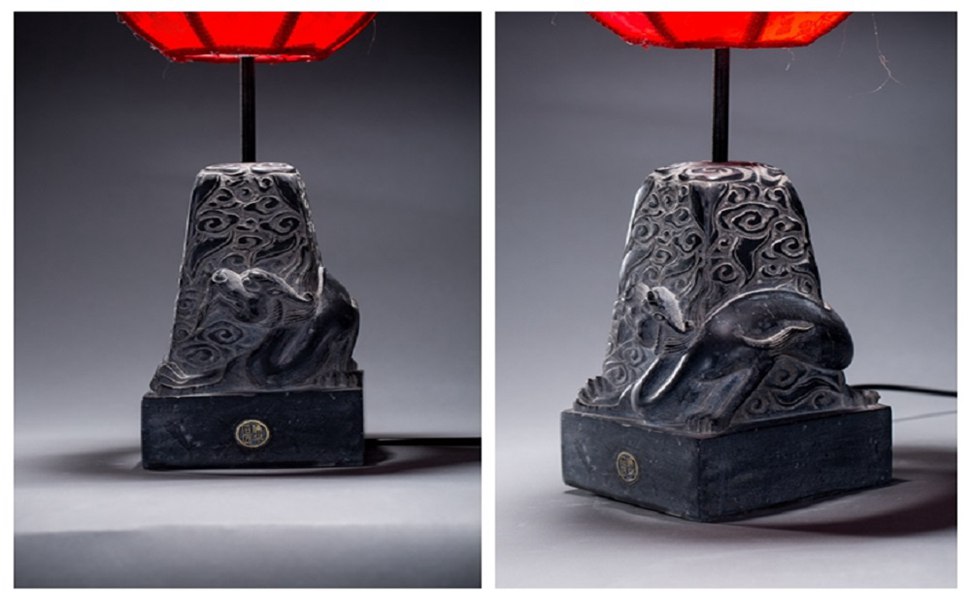 臺(tái)燈上的青龍，被雕刻家雕刻得惟妙惟肖.